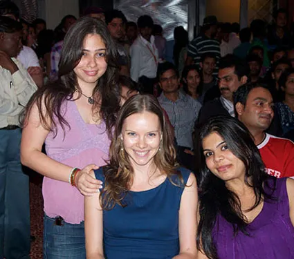Della team members enjoying a fun-at-work activity in the office cafe